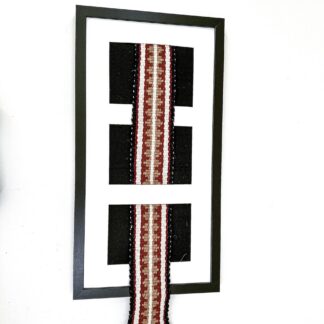 A frame with a piece of Sadu ( AM001)